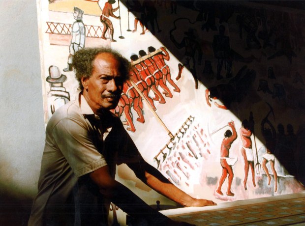 Carl Abrahams at work on the airport mural, photographed by Deryck Roberts, c1985